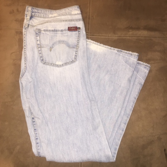 size 31 silver jeans is what size